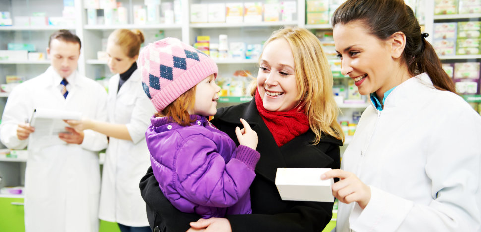 pharmacist assisting customer