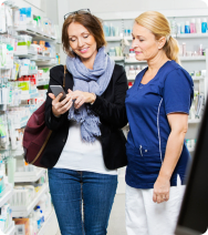 pharmacist assisting customer